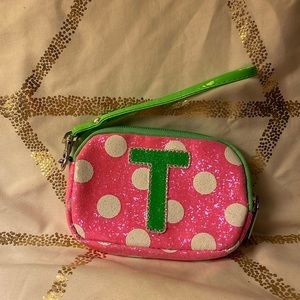 Justice- small wristlet/card holder with the letter T-like new.